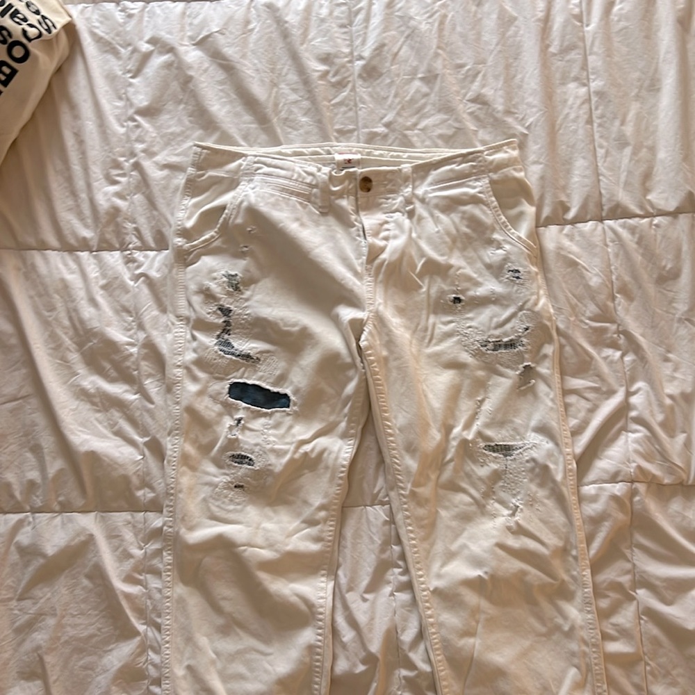 True Religion vintage white cotton destroyed wash pants.